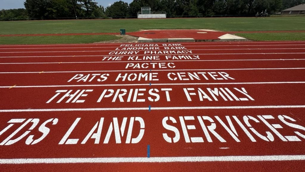 close-up of freshly painted line markings for Silliman Institute Private Academy track