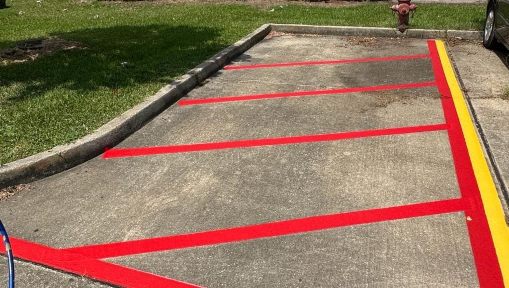 close-up of fire lane striping for Extended Stay America parking lot
