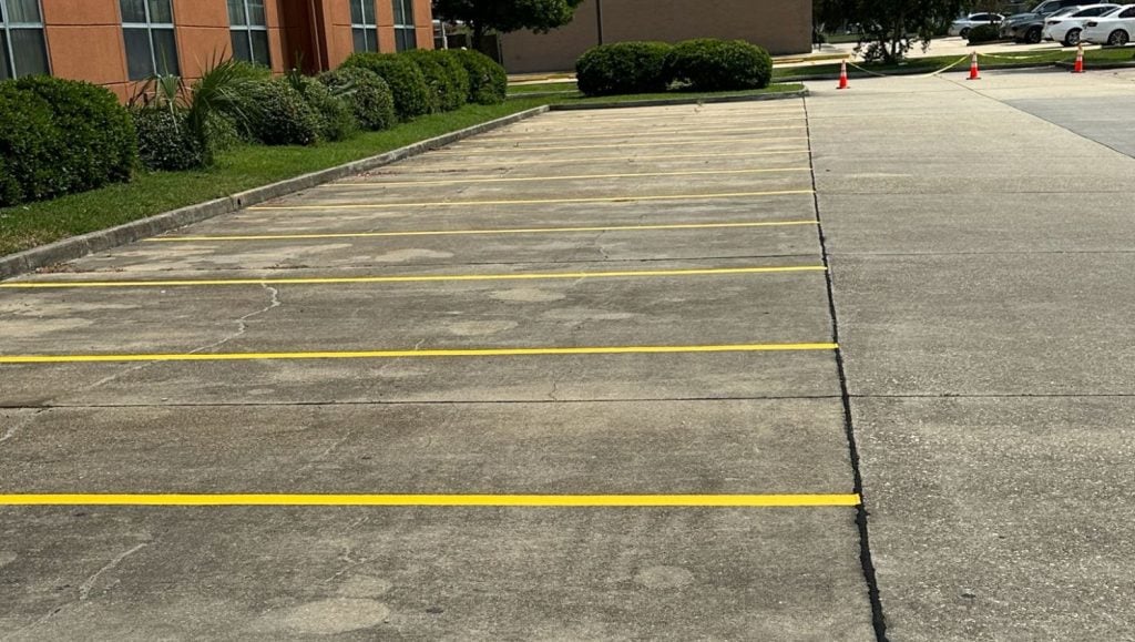 Extended Stay America parking lot freshly painted close-up