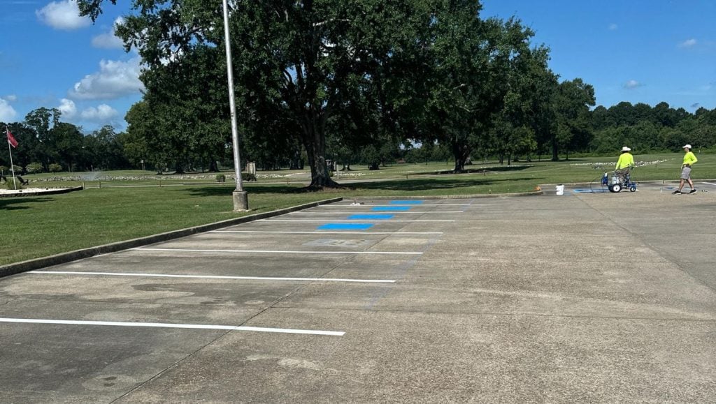 Les Vieux Chenes Golf Course parking lot with freshly painted line markings