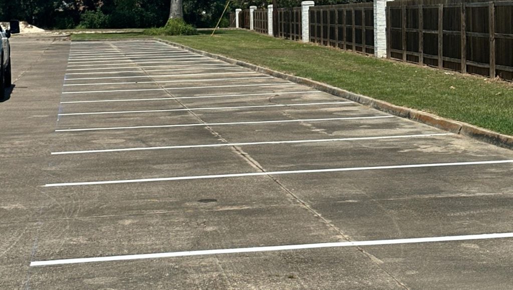 parking spots freshly painted close-up for Les Vieux Chenes Golf Course