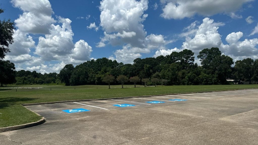 ada compliance parking spots freshly painted for Les Vieux Chenes Golf Course parking lot