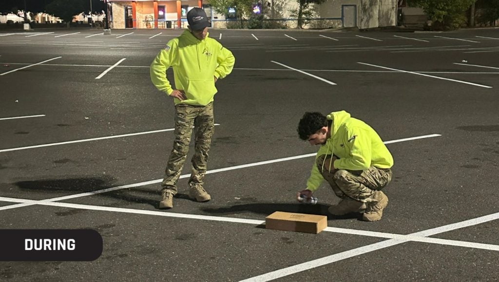 two G-FORCE® employees working on Rouses’s Market parking lot