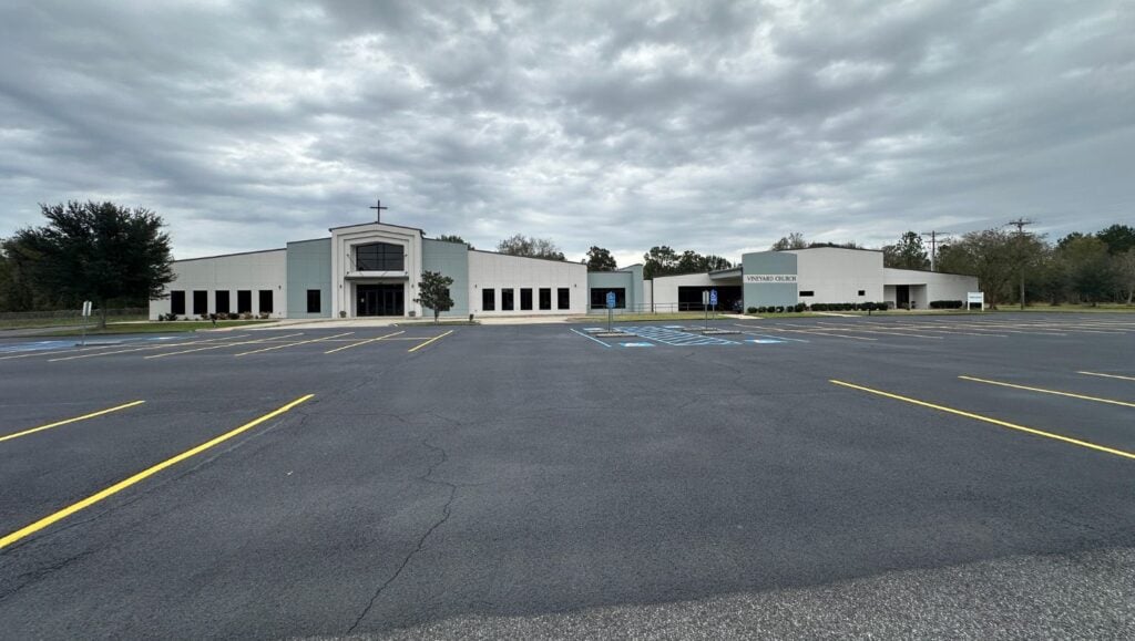 front view of Vineyard Church parking lot freshly painted