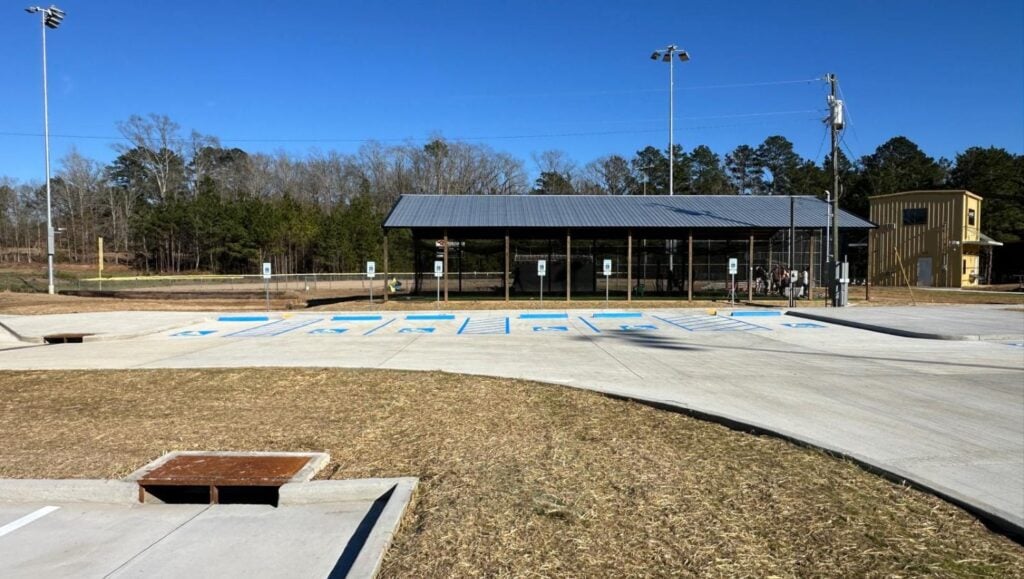 Dodson High School parking lot with freshly painted ada compliance parking spots