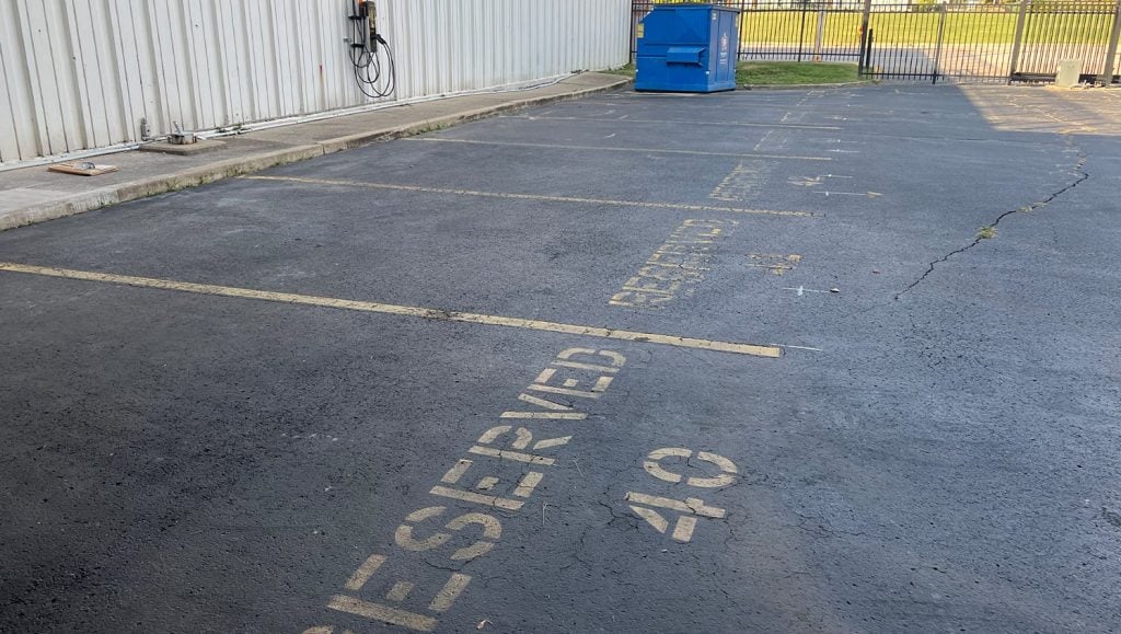 Amteck of KY Inc. parking lot before new line markings