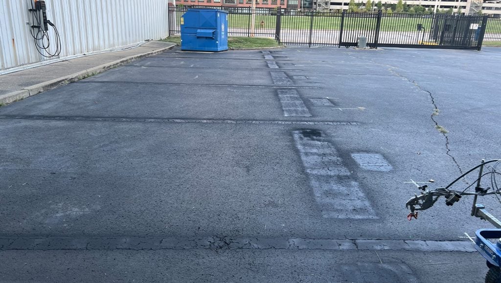 freshly painted ev markings for Amteck of KY Inc. parking lot