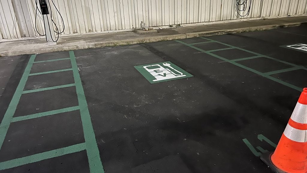 close-up of green line markings for Amteck of KY Inc. ev charging parking spots