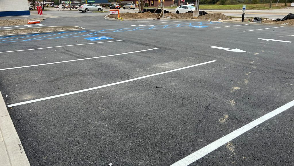 Realm Construction Company parking lot with new line striping
