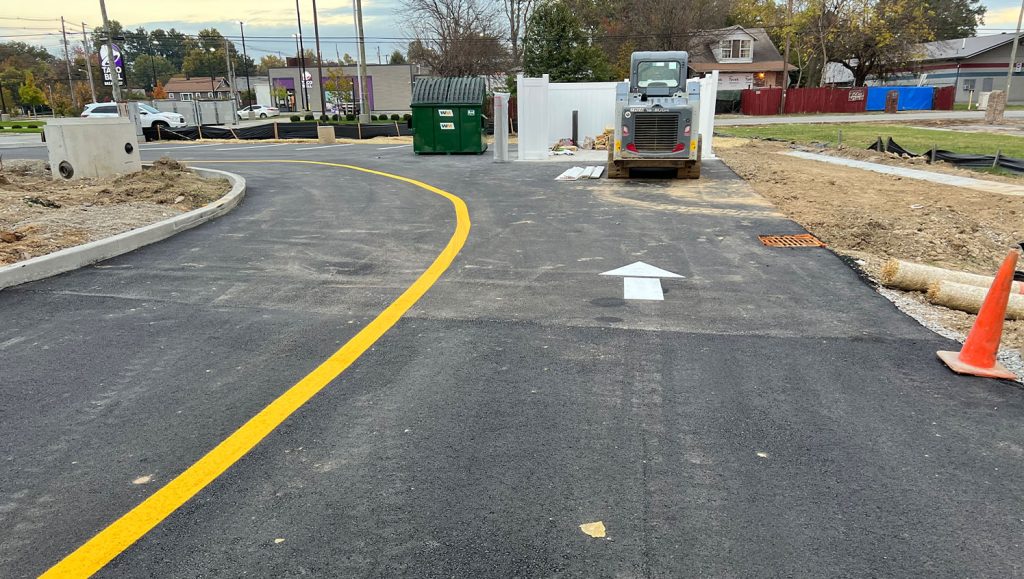 close-up of freshly painted line markings for Realm Construction Company