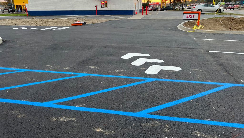 Realm Construction Company parking lot with new freshly painted line markings