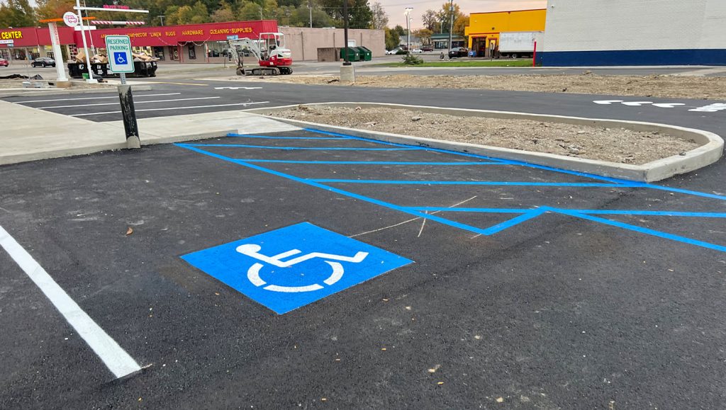 parking spots freshly painted for Realm Construction Company parking lot