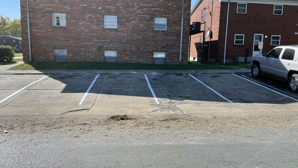 apartment complex parking lot before striping