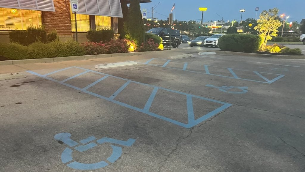 faded parking lot lines in Chuy’s Tex-Mex parking lot