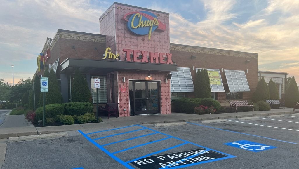 Chuy’s Tex-Mex parking lot with faded lines