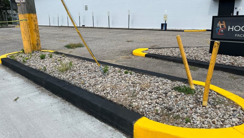 close-up of a painted curb at hood container