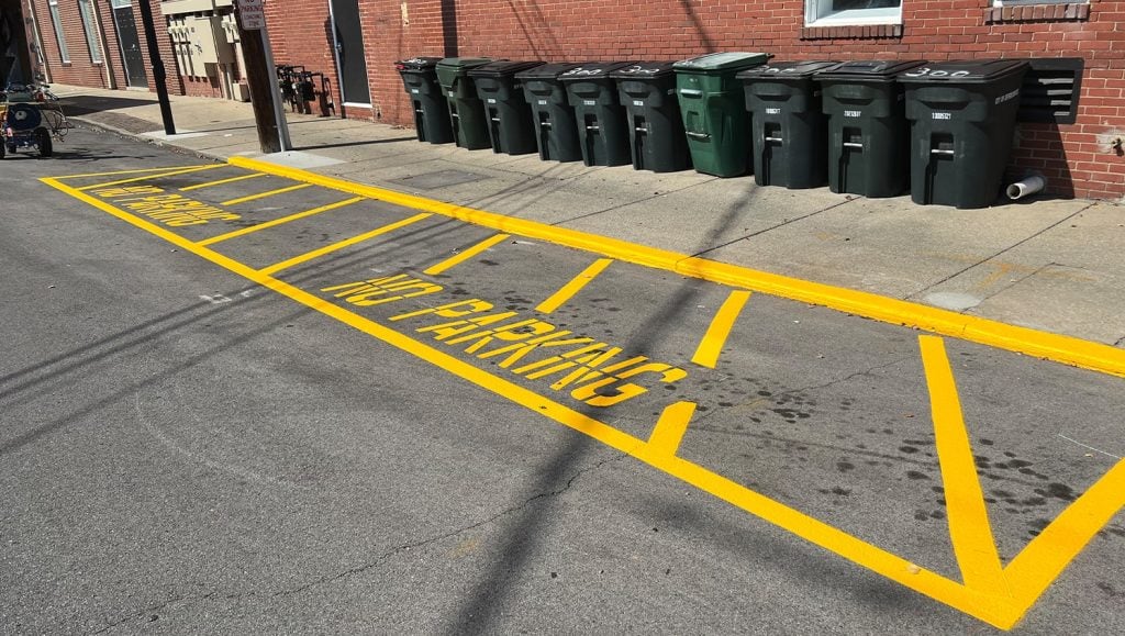 no parking line markings freshly painted for 300 Spring