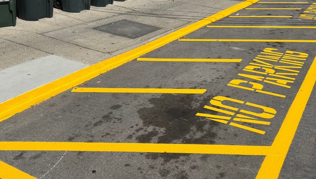 freshly painted line markings for 300 Spring parking lot
