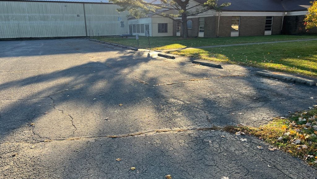 close-up of ada compliance parking spots freshly painted