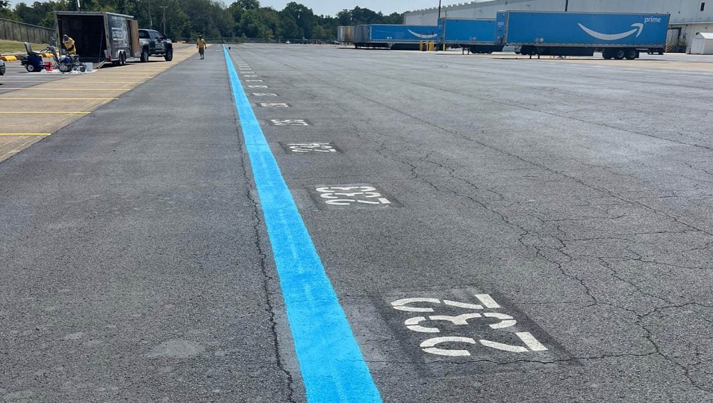 close-up of freshly painted line markings for amazon
