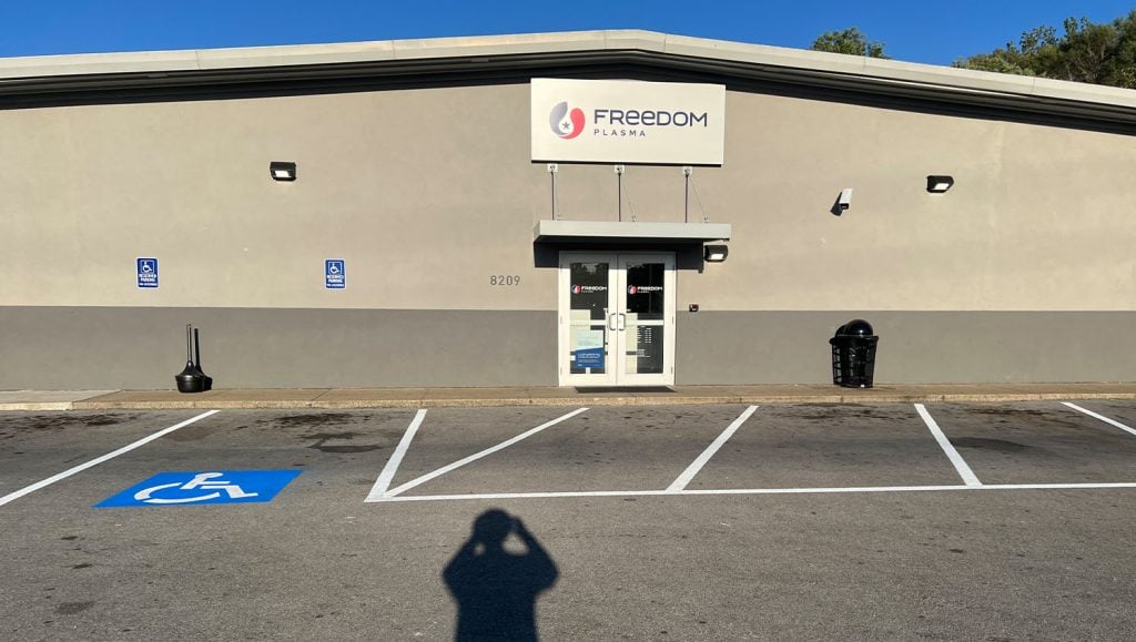 Freedom Plasma parking spots faded before new line striping