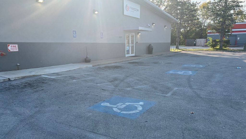 freshly painted line markings for Freedom Plasma parking lot
