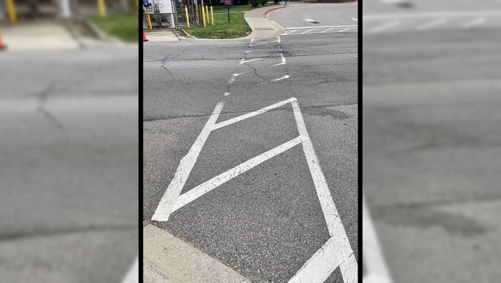 faded crosswalk at medical center