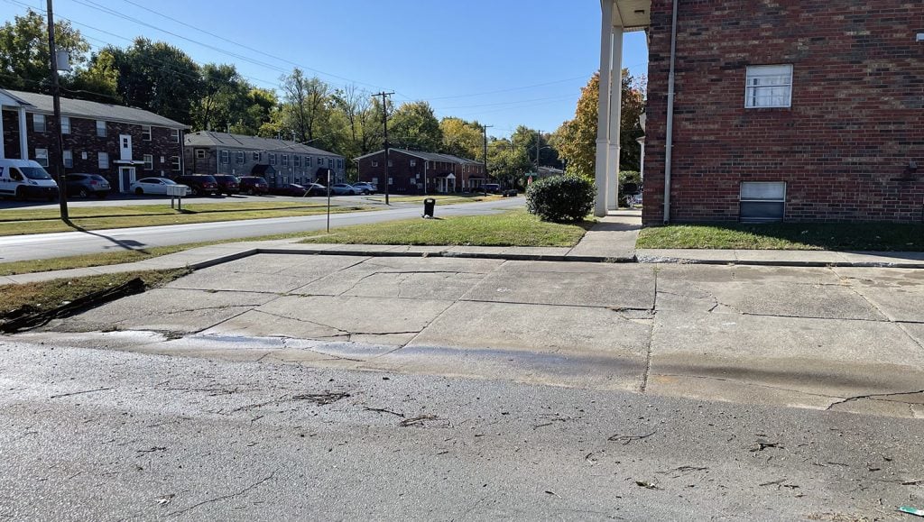 view of apartment complex after parking lot striping