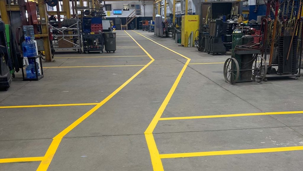 FIBA Technologies, Inc. warehouse with faded line markings