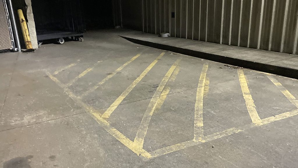 worn-out parking lot markings