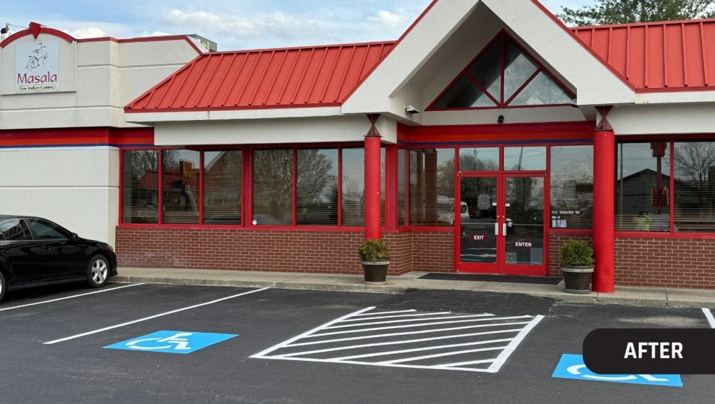 front view of Masala Fine Indian Cuisine parking lot freshly painted