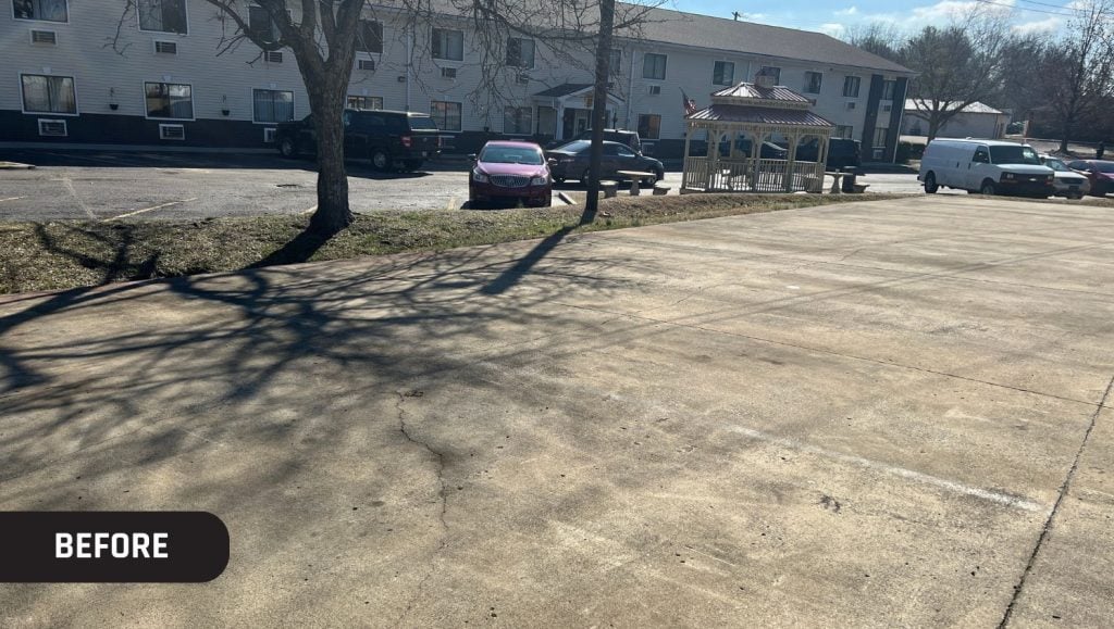 Joy Automotive parking lot before parking stops are installed