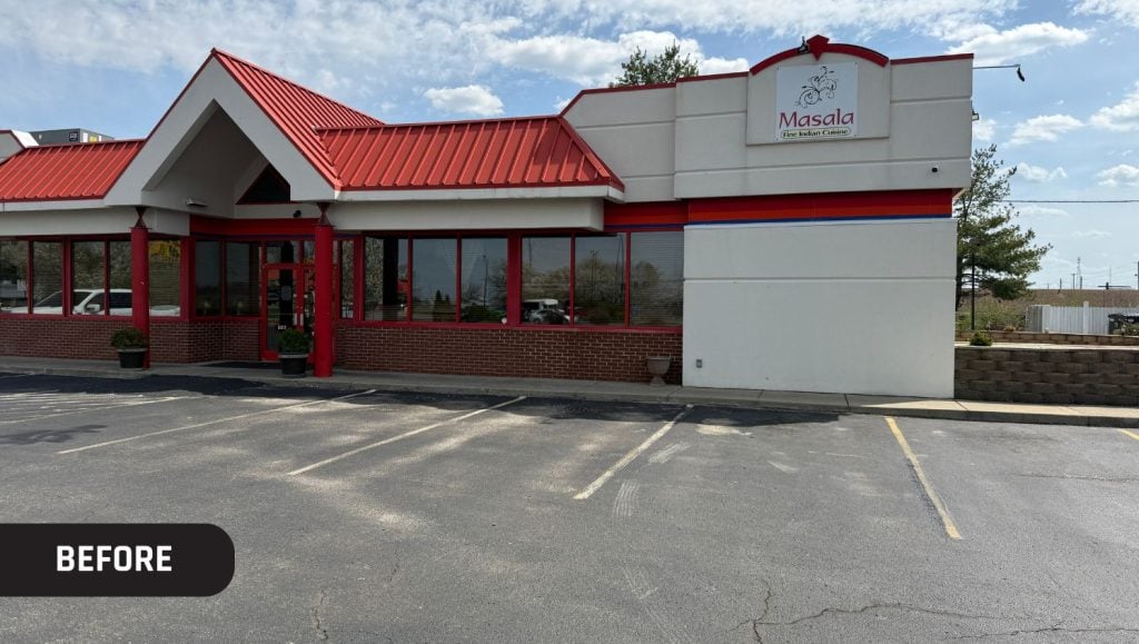 Masala Fine Indian Cuisine parking lot with faded parking spots