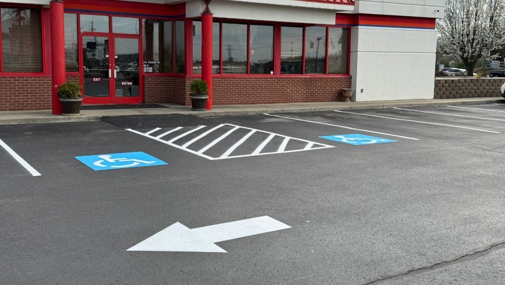 freshly painted line markings for Masala Fine Indian Cuisine parking lot