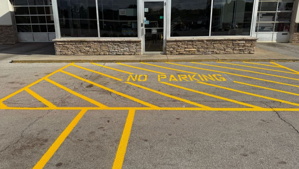 no parking line markings freshly painted for Big O Tires