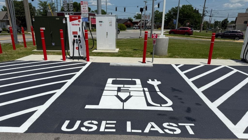front view close-up of ev charging bay markings freshly painted for Circle K parking lot