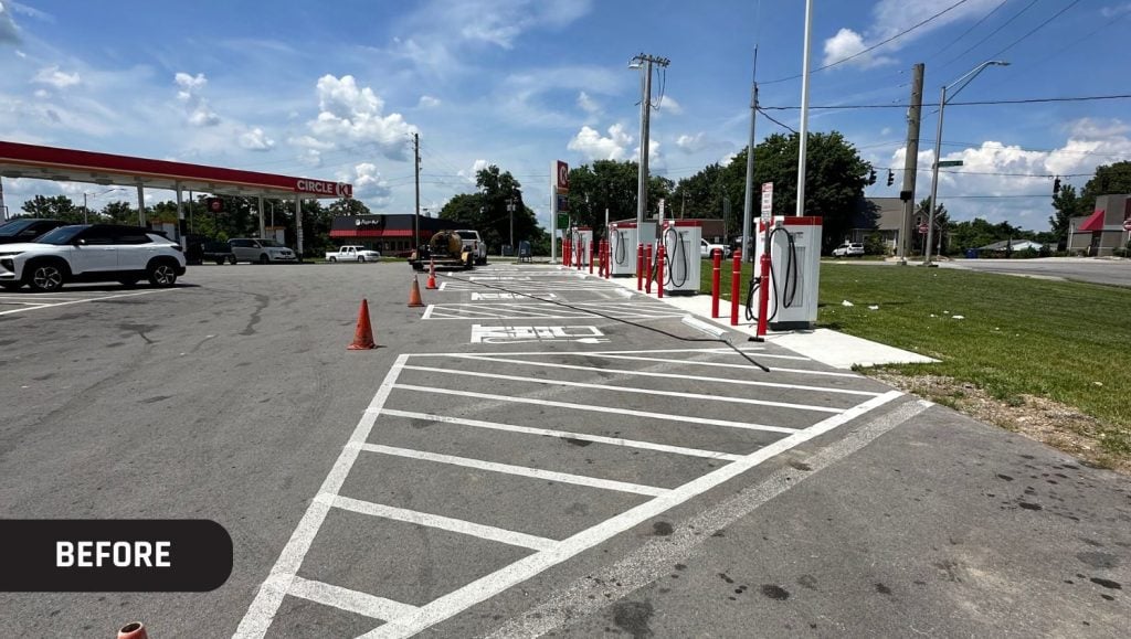 before portrait of Circle K parking lot with faded ev charging parking lot lines
