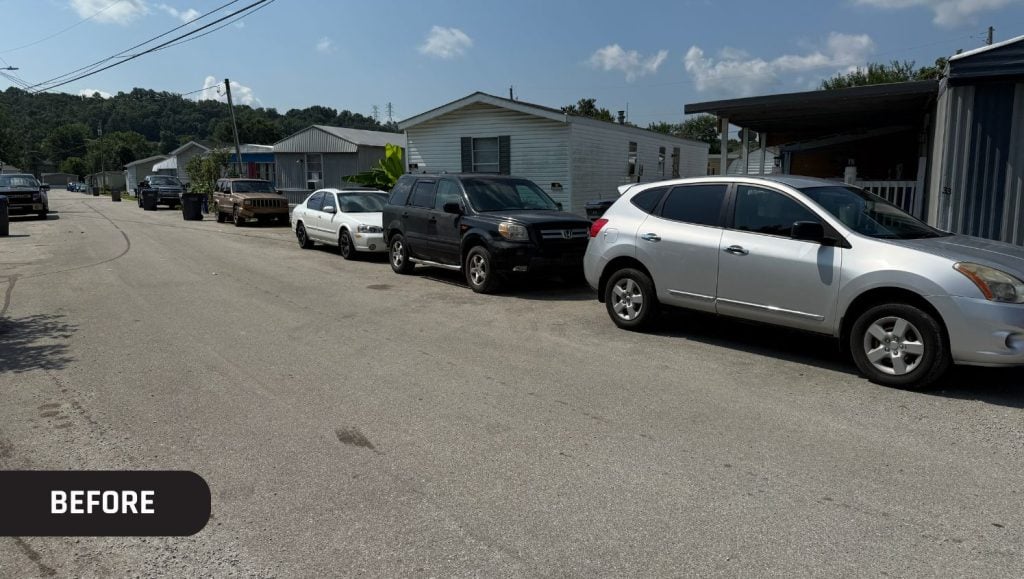 before portrait of Cardinal Mobile Home Park parking lot with no line striping