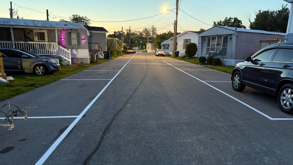 freshly painted line markings for Cardinal Mobile Home Park parking lot