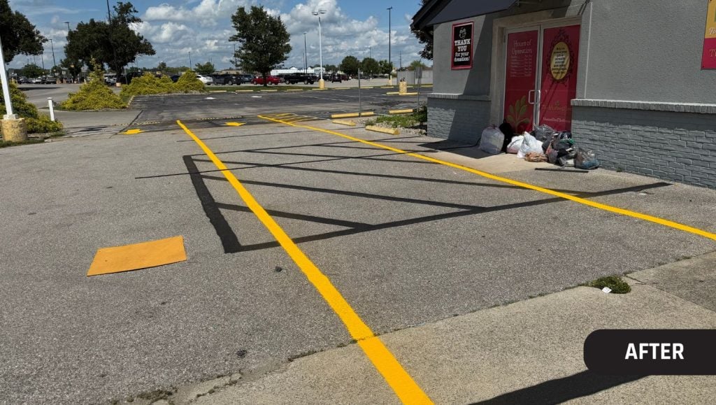 yellow drive thru lines freshly painted for The Mustard Seed