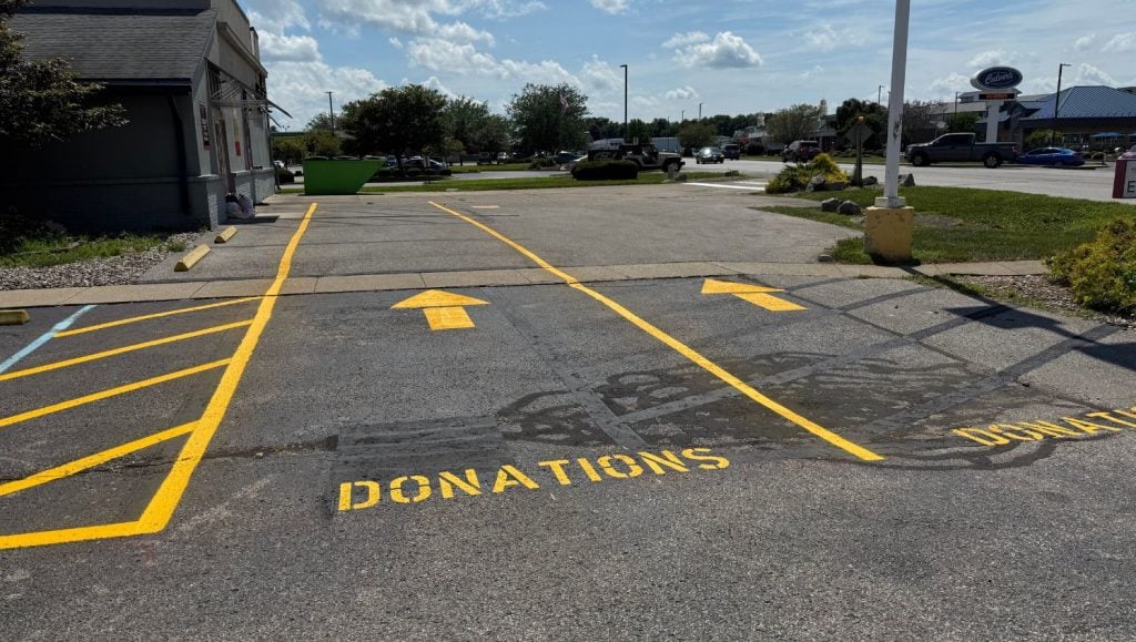 freshly painted drive thru lines for The Mustard Seed parking lot