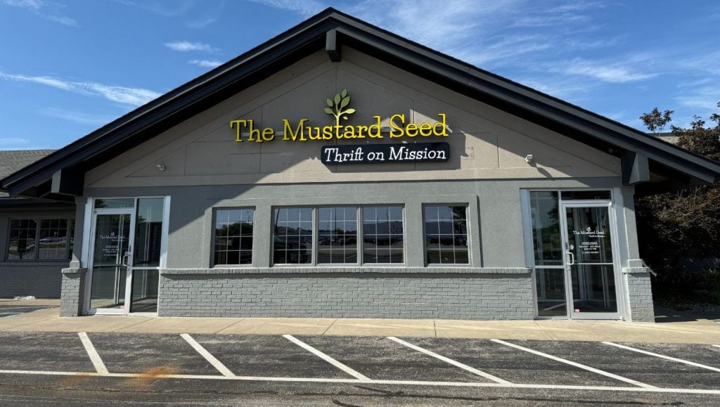 front view of the The Mustard Seed parking lot freshly painted