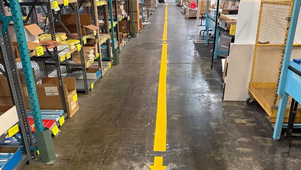 yellow line markings freshly painted for Kentucky Lottery warehouse