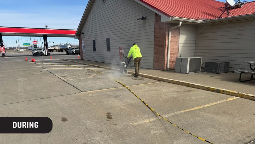 during portrait of g-force® employee installing new line markings