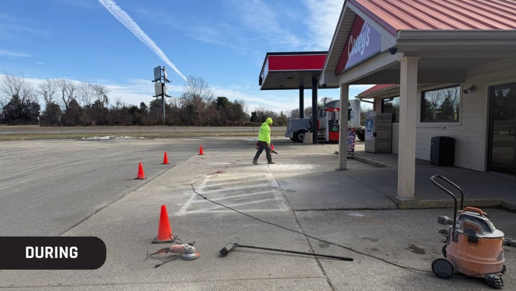 Casey’s Pizza Delivery parking lot in the process of installing new parking lot lines