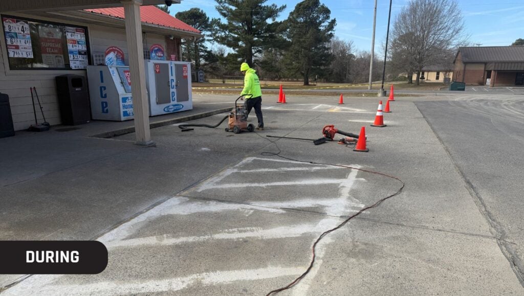 G-FORCE® employee installing new parking spots for Casey’s Pizza Delivery