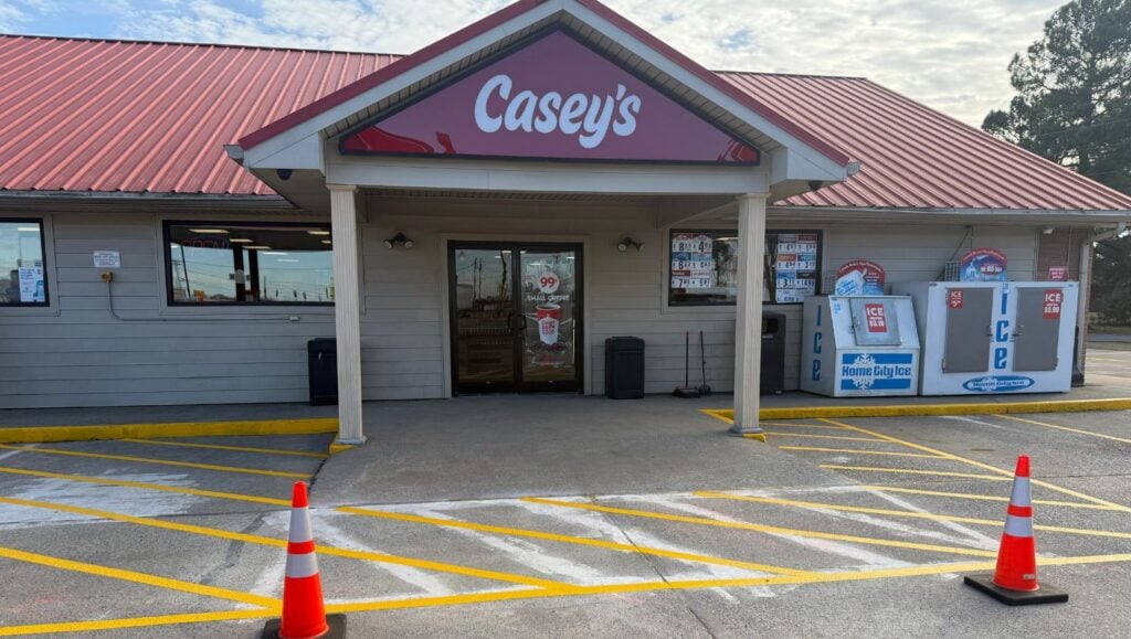 front view of Casey’s Pizza Delivery parking lot freshly painted