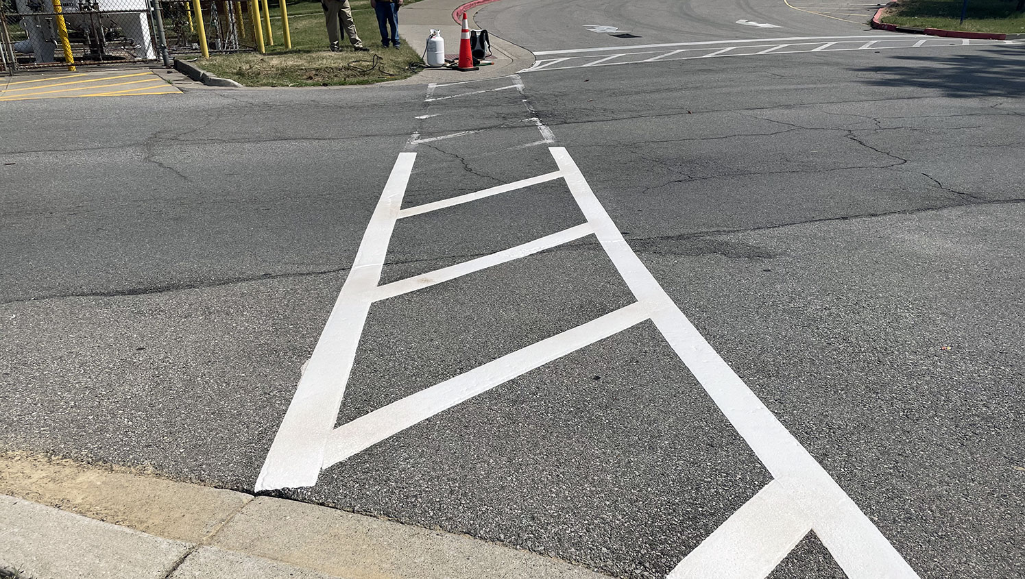 re-striped thermoplastic crosswalk at medical center