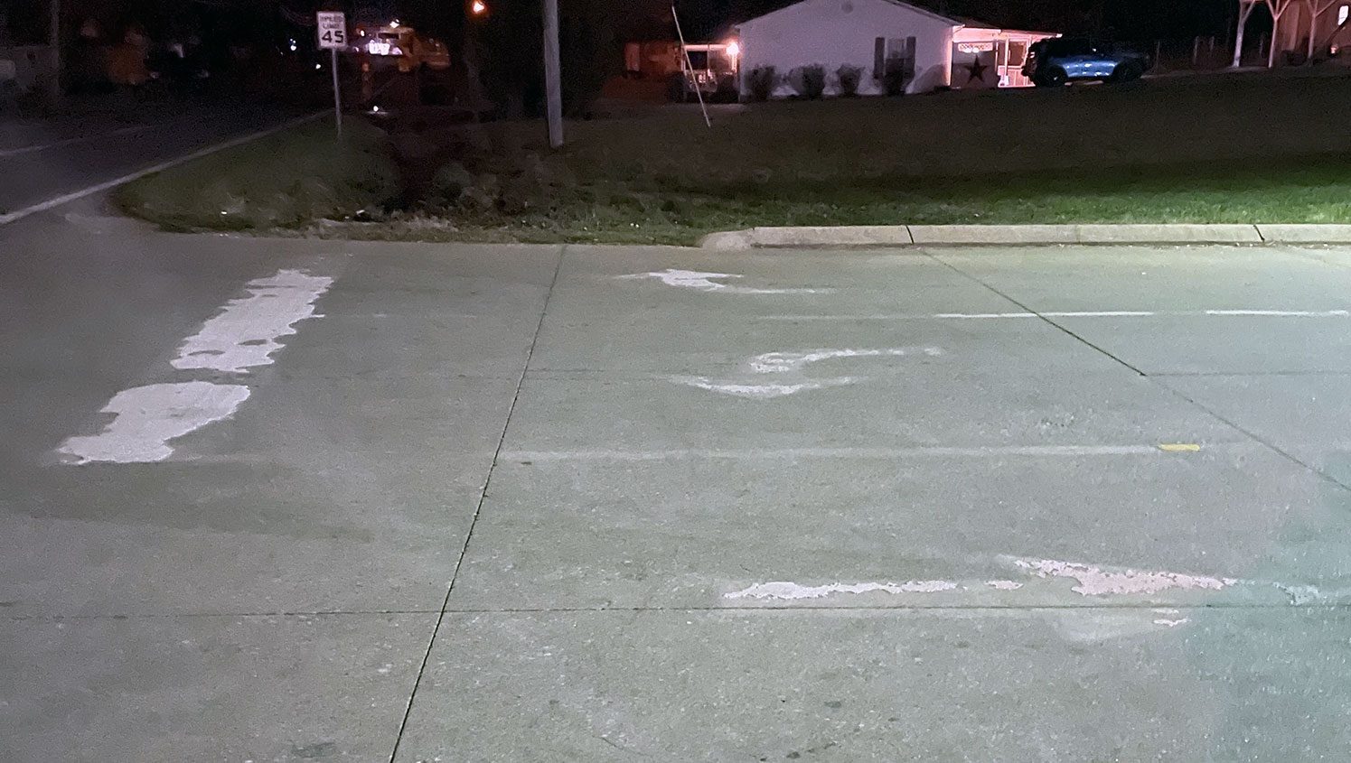 worn-out parking lot arrows