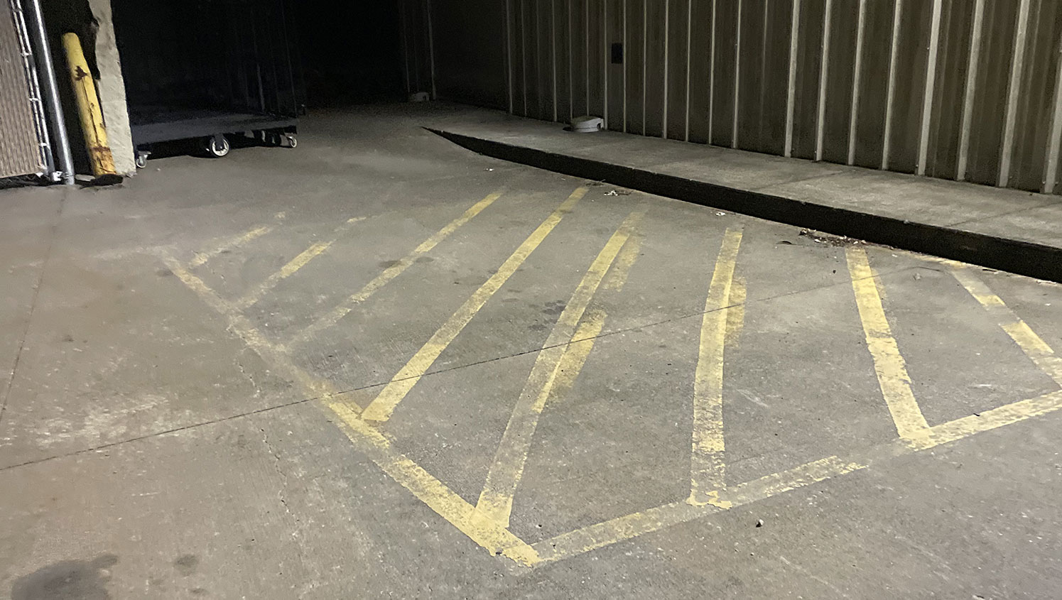 worn-out safety markings in parking lot